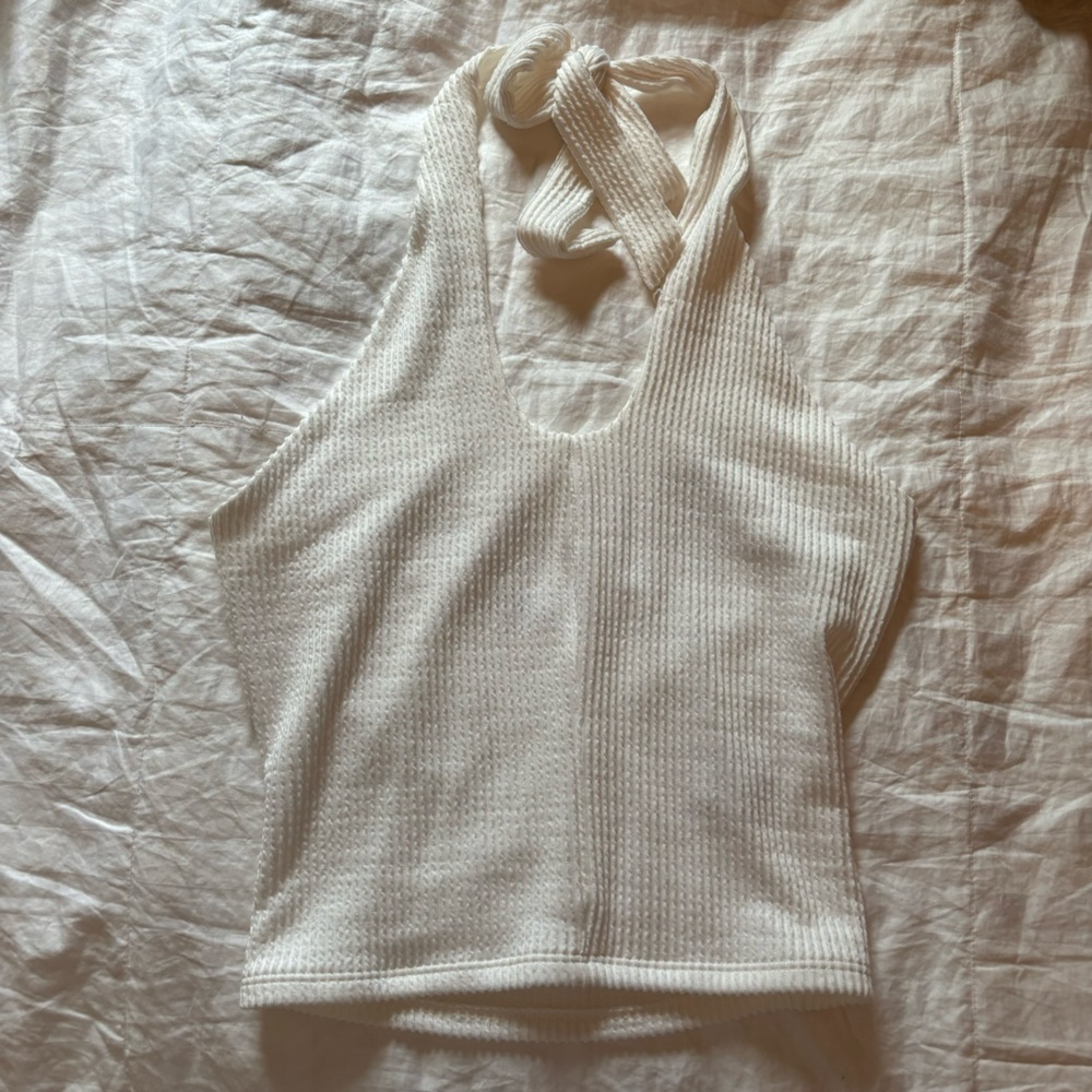 Never worn! White around the neck crop top, women’s extra small, fits big!